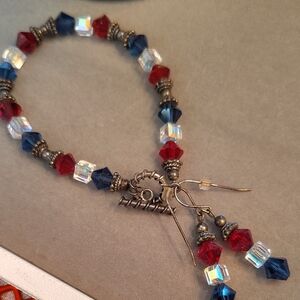 Elegant Beaded Bracelet with Red and Blue Crystals